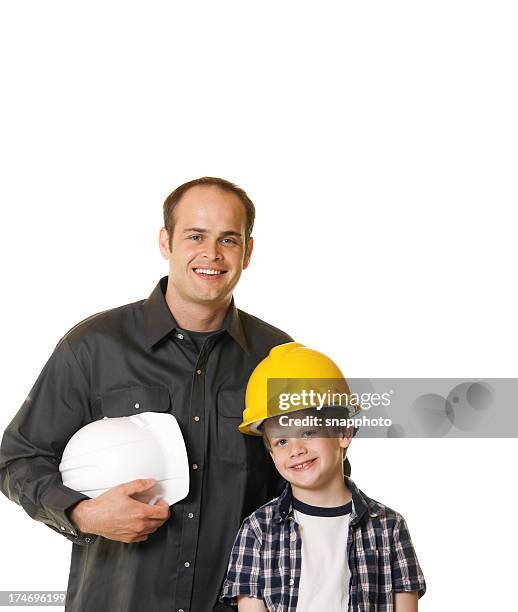 enfant et homme ou père portant chapeau dur de construction - boy in hard hat photos et images de collection