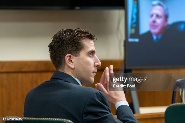 Bryan Kohberger listens to arguments during a hearing to overturn his grand jury indictment on October 26, 2023 in Moscow, Idaho. Kohberger, a former...