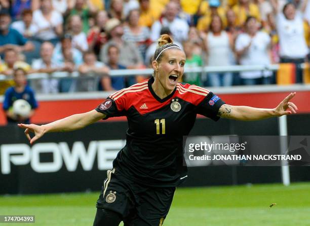 Germany's forward Anja Mittag celebrates scoring during the UEFA Women's European Championship Euro 2013 final Germany vs Norway on July 28, 2013 in...
