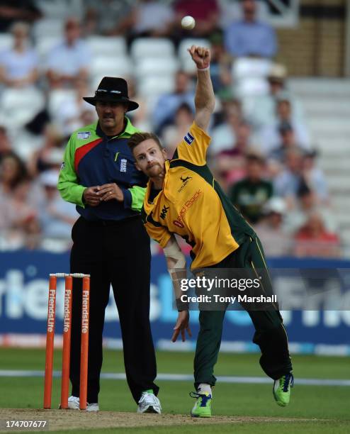 Graeme White of Nottinghamshire Outlaws bowling during the Friends Life T20 match between Nottinghamshire Outlaws and Lancashire Lightning at Trent...