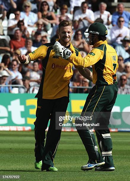 Graeme White of Nottinghamshire Outlaws celebrates bowling and catching out Simon Katich of Lancashire Lightning during the Friends Life T20 match...