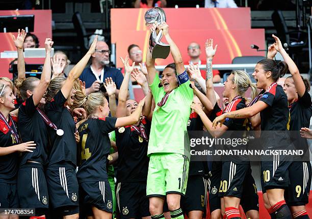 Germany's players celebrate with the trophy after winning the UEFA Women's European Championship Euro 2013 final Germany vs Norway on July 28, 2013...