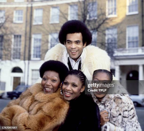 Liz Mitchell, Marcia Barrett, Maizie Williams and Bobby Farrell, of the German vocal group Boney M., pose for a portrait in London, England, November...