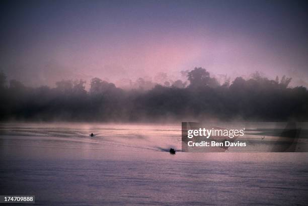 Dawn over the Mekong River in the village of Sangkhom in Northeast Thailand. The Mekong, known to the Thais as the Mother of All Rivers, forms a...