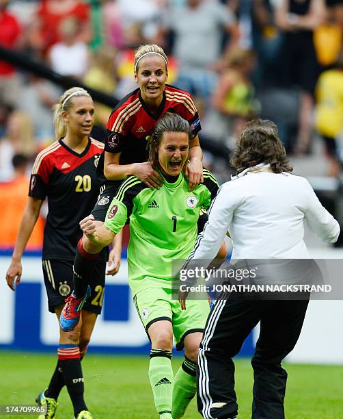 Germany's goalkeeper Nadine Angerer celebrates with her teammates after winning the UEFA Women's European Championship Euro 2013 final Germany vs...