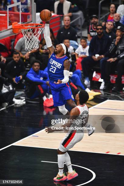 Los Angeles Clippers forward Robert Covington dunks the ball during a NBA game between the Denver Nuggets and the Portland Trail Blazers on October...