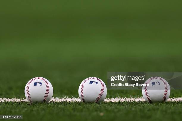 Three baseballs are seen prior to Game Five of the American League Championship Series between the Texas Rangers and the Houston Astros at Globe Life...