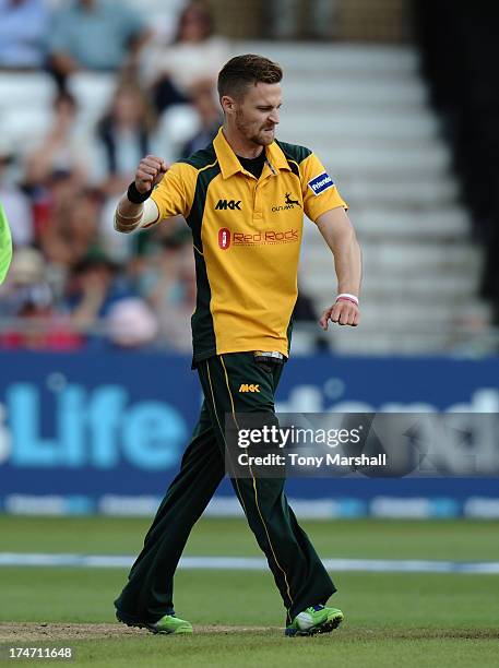 Graeme White of Nottinghamshire Outlaws celebrates taking the wicket of Glen Chapple of Lancashire Lightning, his fifth wicket of the match, during...