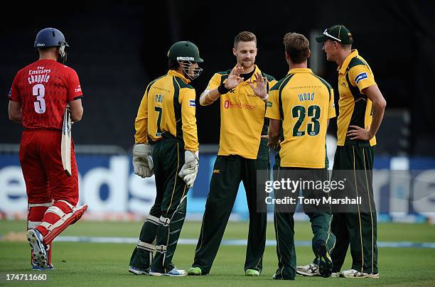 Graeme White of Nottinghamshire Outlaws celebrates taking the wicket of Glen Chapple of Lancashire Lightning, his fifth wicket of the match, during...