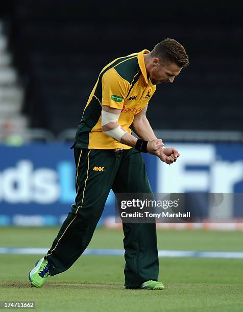 Graeme White of Nottinghamshire Outlaws celebrates taking the wicket of Glen Chapple of Lancashire Lightning, his fifth wicket of the match, during...