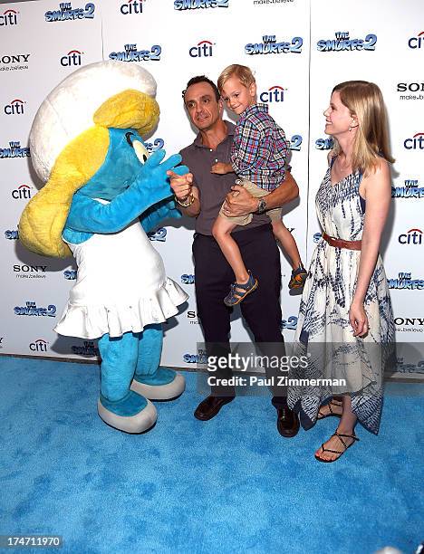 Smurfette, Hank Azaria, Hal Azaria and Katie Wright attend "The Smurfs 2" New York Blue Carpet Screening at Lighthouse International Theater on July...
