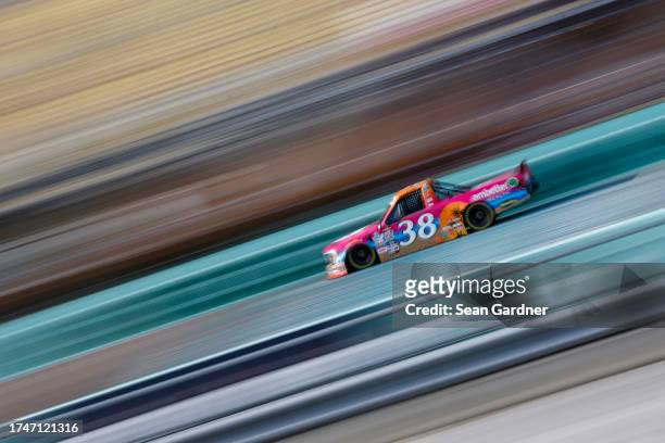 Zane Smith, driver of the Ambetter Health Ford, drives during practice for the NASCAR Craftsman Truck Series Baptist Health Cancer Care 200 at...