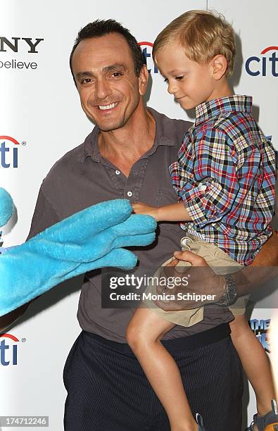 Actor Hank Azaria and son Hal Azaria attend "The Smurfs 2" New York Blue Carpet Screening at Lighthouse International Theater on July 28, 2013 in New...