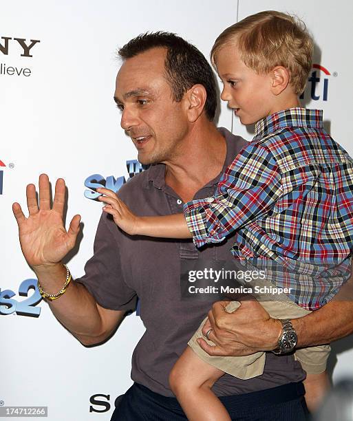 Actor Hank Azaria and son Hal Azaria attend "The Smurfs 2" New York Blue Carpet Screening at Lighthouse International Theater on July 28, 2013 in New...