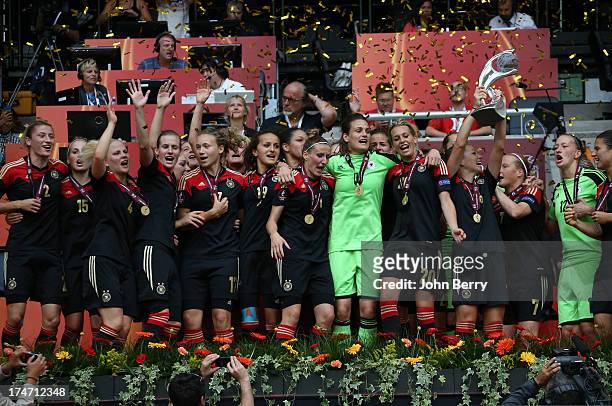 Nadine Angerer, goalkeeper and captain of Germany celebrates the victory with her teammates during the trophy ceremony after the UEFA Women's Euro...