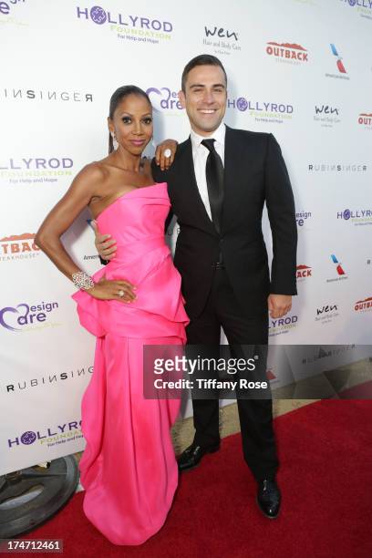 Holly Robinson Peete and fashion designer Rubin Singer attends the 15th Annual DesignCare benefiting The HollyRod Foundation on July 27, 2013 in...