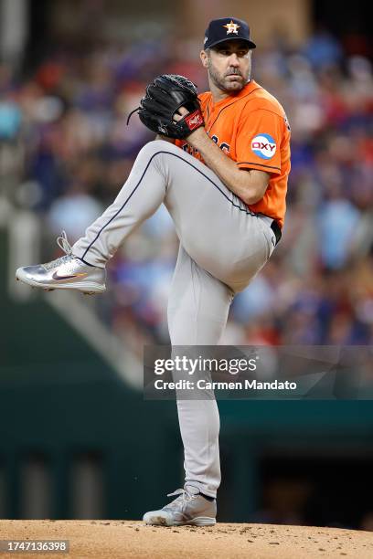 Justin Verlander of the Houston Astros throws a pitch against the Texas Rangers during the first inning in Game Five of the American League...