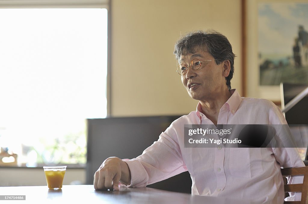 Senior man relaxing in the living room