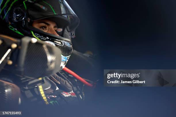 Hailie Deegan, driver of the Fresh from Florida Ford, sits in her truck during qualifying for the NASCAR Craftsman Truck Series Baptist Health Cancer...
