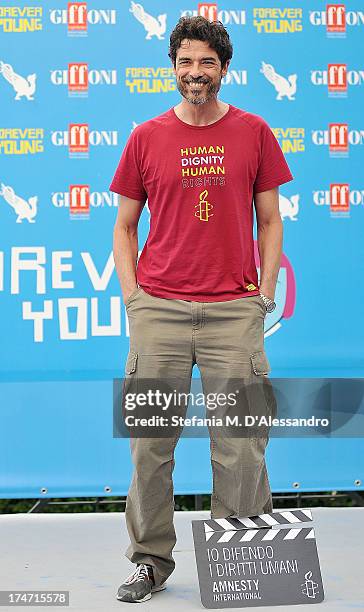 Alessandro Gassman attends 2013 Giffoni Film Festival photocall on July 28, 2013 in Giffoni Valle Piana, Italy.