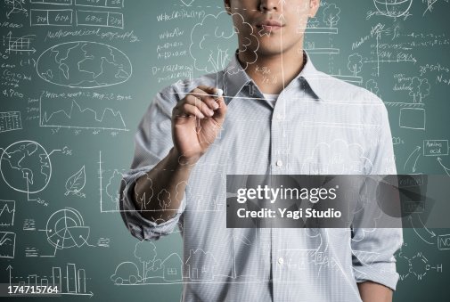 Man Writting A Formula And Picture In Chalk High-Res Stock Photo ...