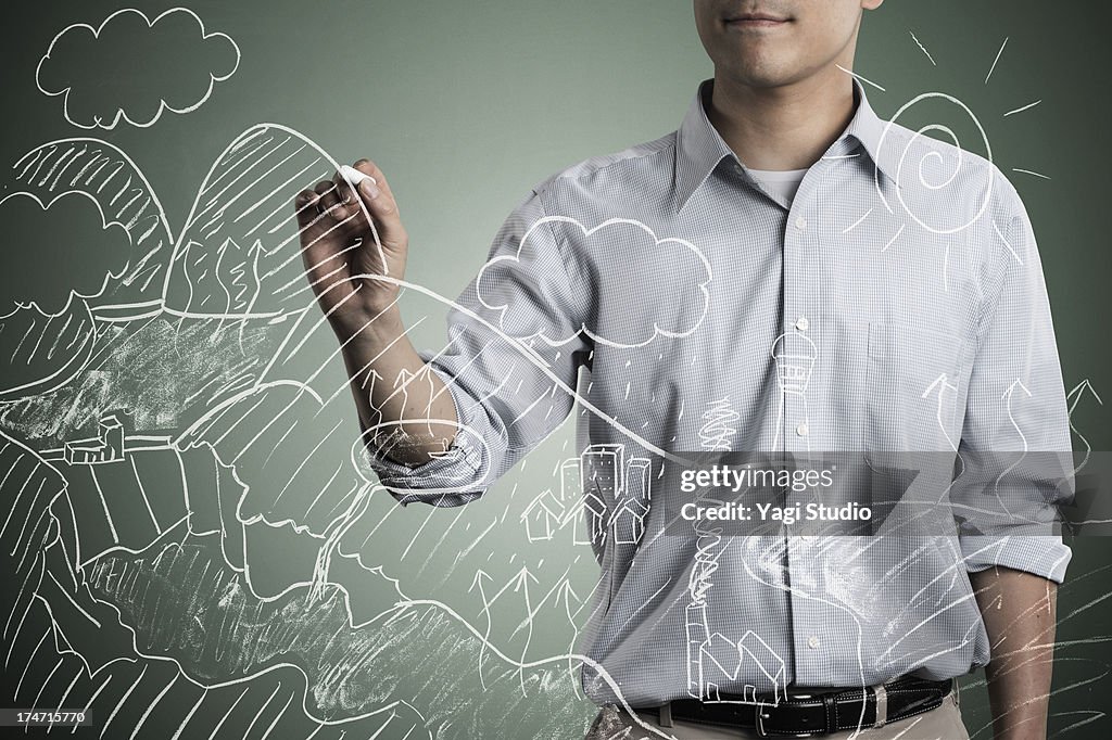 Man Writting A Formula And Picture In Chalk High-Res Stock Photo ...
