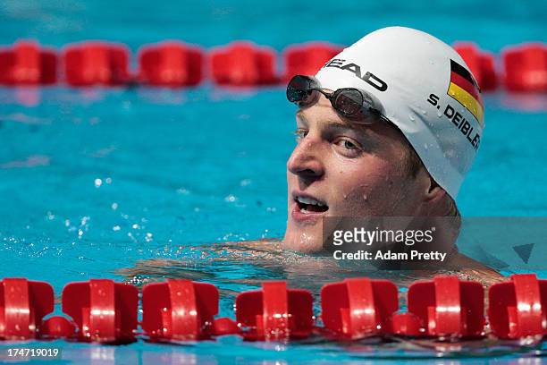 Steffen Deibler of Germany looks on after the Swimming Men's 50m Butterfly Semifinal 2 on day nine of the 15th FINA World Championships at Palau Sant...