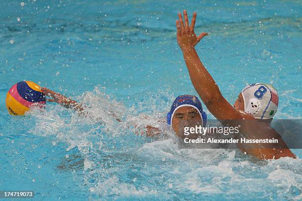 Valentino Gallo of Italy in action with Jiang Zhang of China during the Men's Water Polo quarterfinals qualification match between Italy and China...