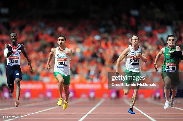 Ola Abidogun of Great Britain, Gabriel Cole of Australia, Simon Patmore of Australia and Zivan Smith of South Africa compete in the Mens T46 100m...