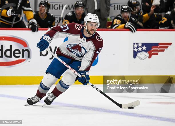 Colorado Avalanche left wing Jonathan Drouin skates with the puck during the second period in the NHL game between the Pittsburgh Penguins and the...