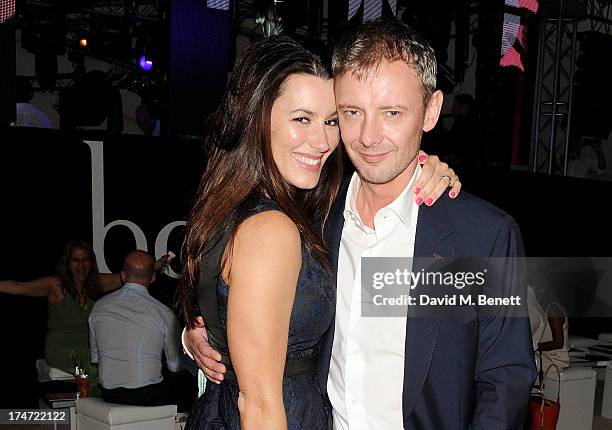 Kate Mcgowan and John Simm attend the Boujis Party at the Audi International Polo day at Guards Polo Club on July 28, 2013 in Egham, England.