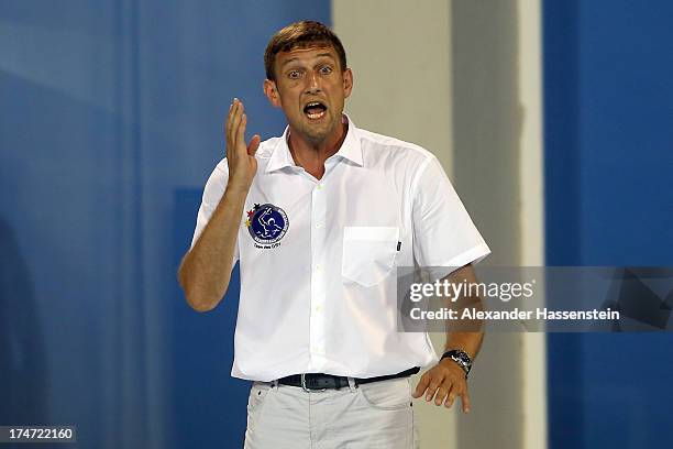 Nebojsa Novoselac, head coach of Germany reacts during the Men's Water Polo quarterfinals qualification match between Germany and Australia during...