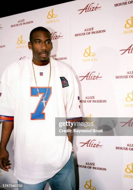 Basketball player Amar'e Stoudamire of the Phoenix Suns poses for photos on the red carpet during the 'Alize House of Passion' event at the Playboy...