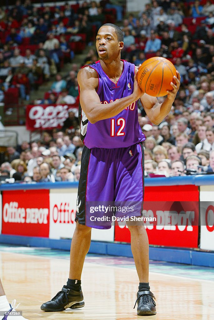 Steven Rafer Rafer Alston of the Toronto Raptors looks to move the ball during the ...