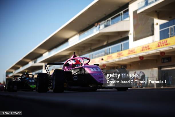 Abbi Pulling of Great Britain and Rodin Carlin drives in the Pitlane during qualifying for the F1 Academy Series Round 7:Austin at Circuit of The...