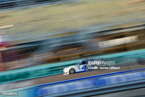 Yeley, driver of the IFCJ.org Chevrolet, drives during practice for the NASCAR Xfinity Series Contender Boats 300 at Homestead-Miami Speedway on...