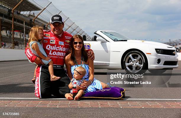 Ryan Newman, driver of the Quicken Loans/The Smurfs Chevrolet, celebrates with wife Krissie and daughters Brooklyn Sage and Ashlyn Olivia after...