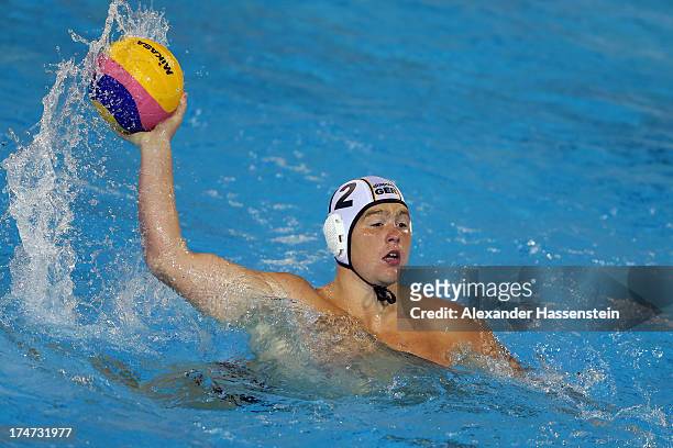 Dennis Eidner of Germany during the Men's Water Polo quarterfinals qualification match between Germany and Australia during day nine of the 15th FINA...