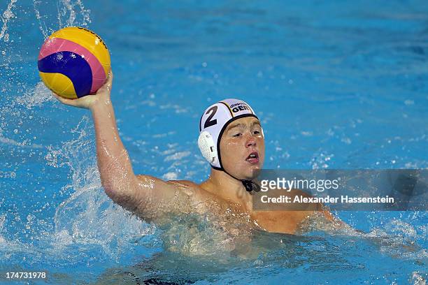 Dennis Eidner of Germany during the Men's Water Polo quarterfinals qualification match between Germany and Australia during day nine of the 15th FINA...