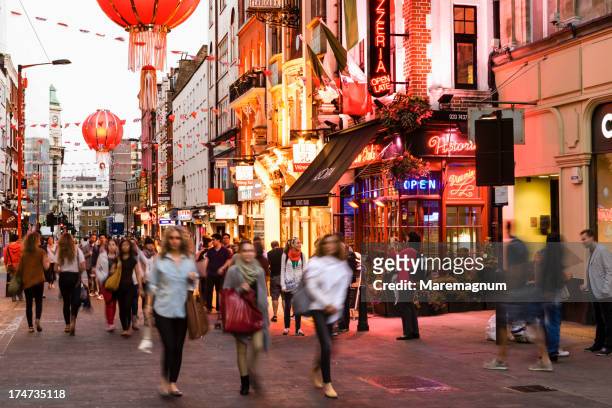 soho, chinatown, view of wardour street - london high street stock pictures, royalty-free photos & images