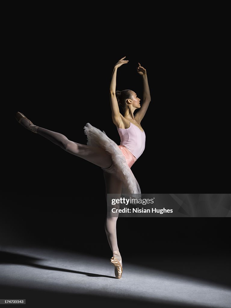 Ballerina Performing Arabesque On Pointe High-Res Stock Photo - Getty ...