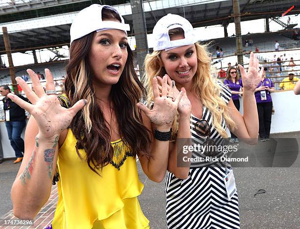 Cassadee Pope and Laura Bell Bundy attend the Brickyard 400 Presented By Big Machine Label Group at Indianapolis Motorspeedway on July 28, 2013 in...