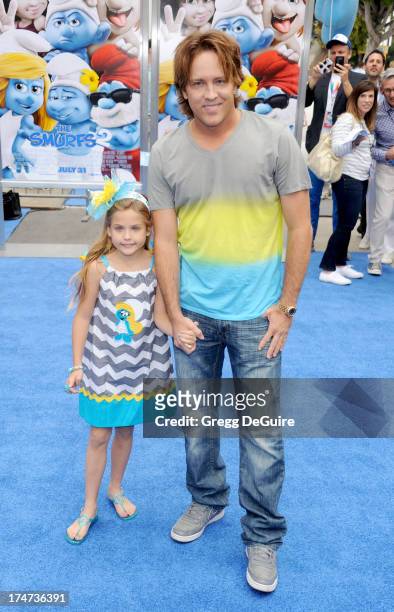 Larry Birkhead and daughter Dannielynn Birkhead arrive at the Los Angeles premiere of "Smurfs 2" at Regency Village Theatre on July 28, 2013 in...