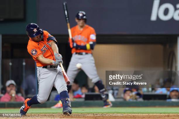 Jose Altuve of the Houston Astros hits a three run home run against Jose Leclerc of the Texas Rangers during the ninth inning in Game Five of the...