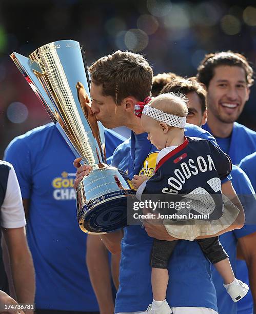 Clarence Goodson of the United States kisses the Gold Cup after a win over Panama during the CONCACAF Gold Cup final match at Soldier Field on July...