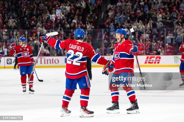 Cole Caufield of the Montreal Canadiens celebrates the overtime winner during the NHL regular season game against the Columbus Blue Jackets at the...