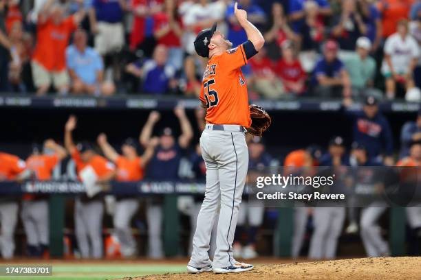 Ryan Pressly of the Houston Astros celebrates after striking out Evan Carter of the Texas Rangers to win Game Five of the American League...