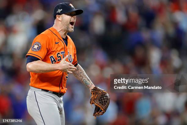 Ryan Pressly of the Houston Astros celebrates after striking out Evan Carter of the Texas Rangers to win Game Five of the American League...