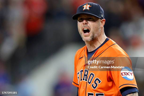 Ryan Pressly of the Houston Astros celebrates after striking out Evan Carter of the Texas Rangers to win Game Five of the American League...