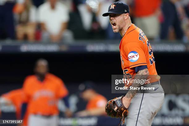 Ryan Pressly of the Houston Astros celebrates after striking out Evan Carter of the Texas Rangers to win Game Five of the American League...